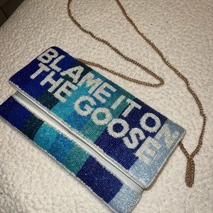 “BLAME IT ON THE GOOSE” beaded clutch